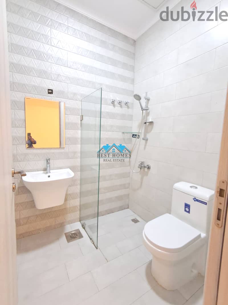 Modern 4 Master Bedrooms Apartment in Rumaithiya 7