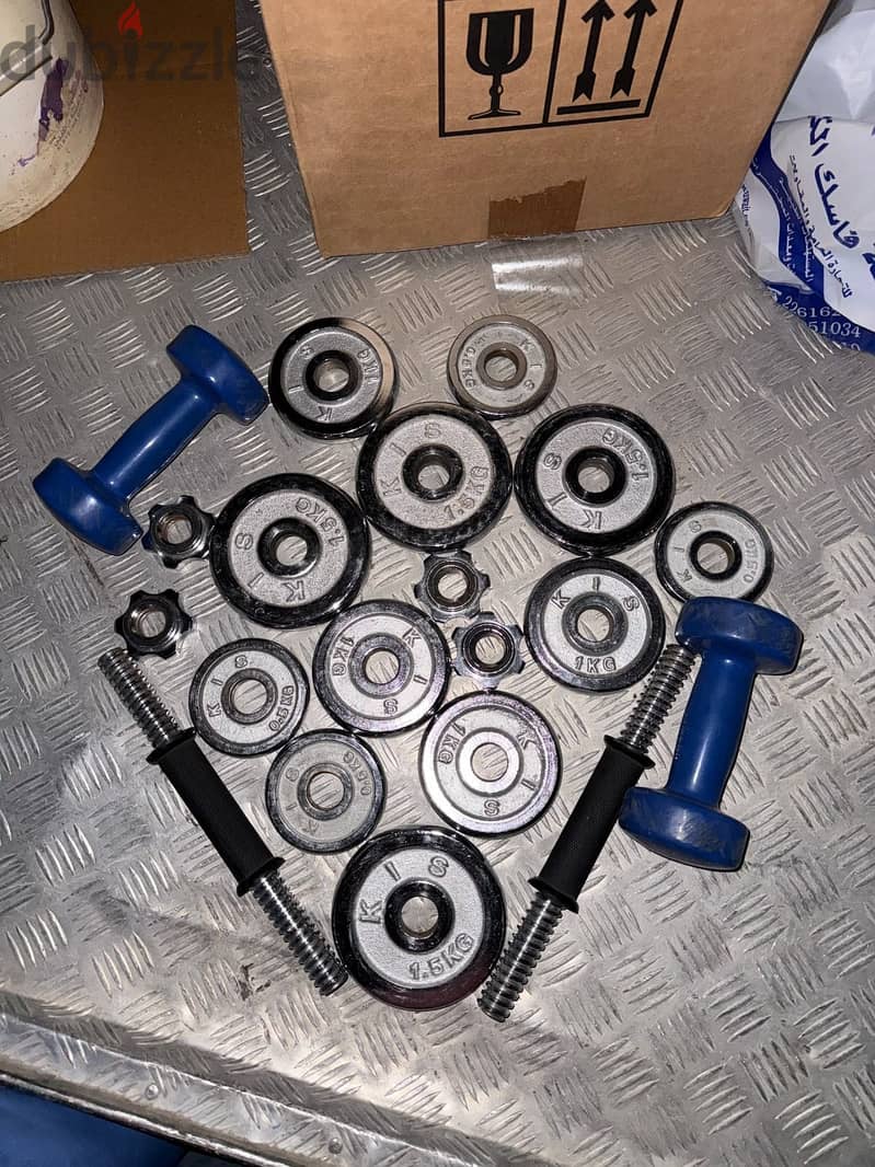Adjustable Dumbbell Set with Plates – Good Condition 1