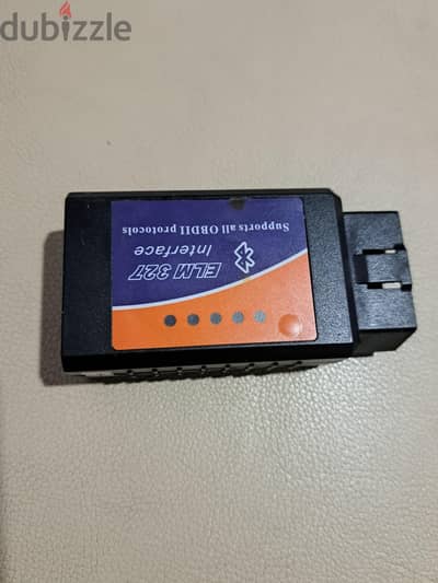 ELM327 Bluetooth OBD II car diagnostic scanner.
