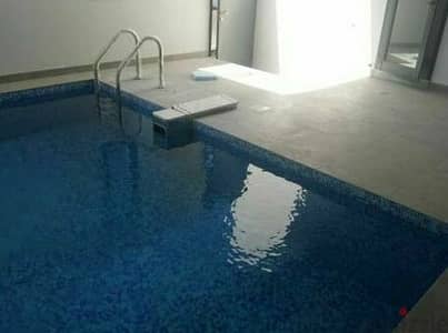 New villa with a private pool for rent in Al-Siddiq