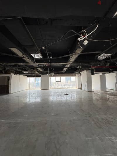 Half a commercial floor with a grace period for rent in Al Murqab