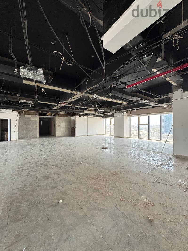 Half a commercial floor with a grace period for rent in Al Murqab 2