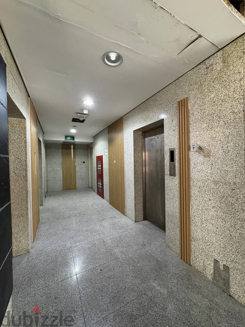 Half a commercial floor with a grace period for rent in Al Murqab 5