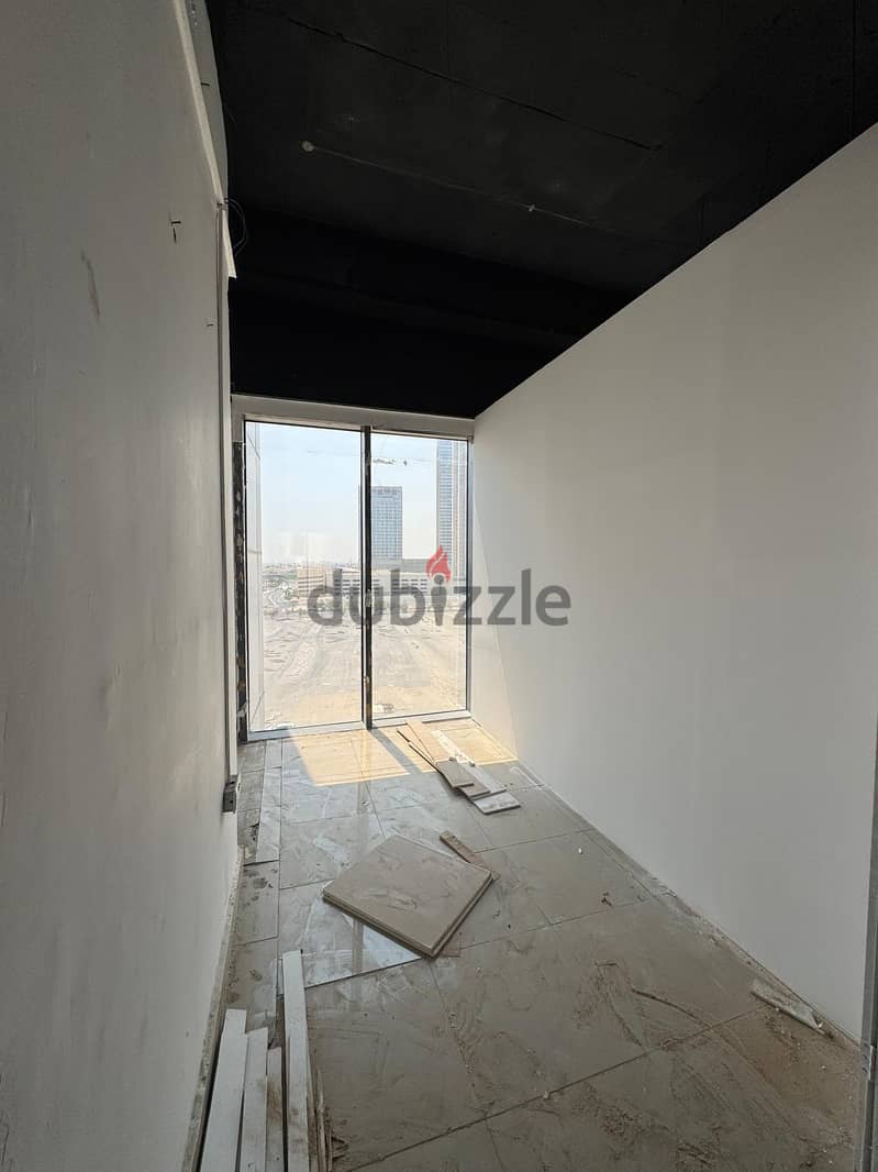 Half a commercial floor with a grace period for rent in Al Murqab 6
