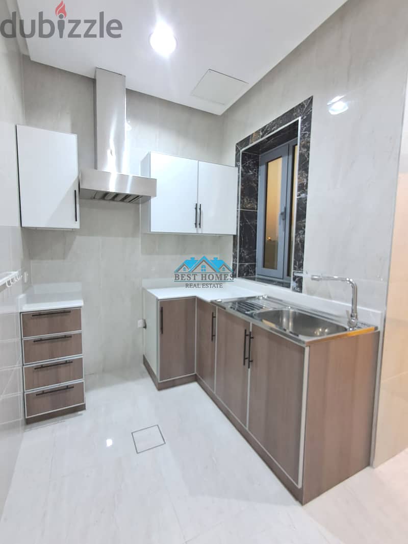 Bright 2 Bedroom Apartment with Rooftop in Rumaithiya 3