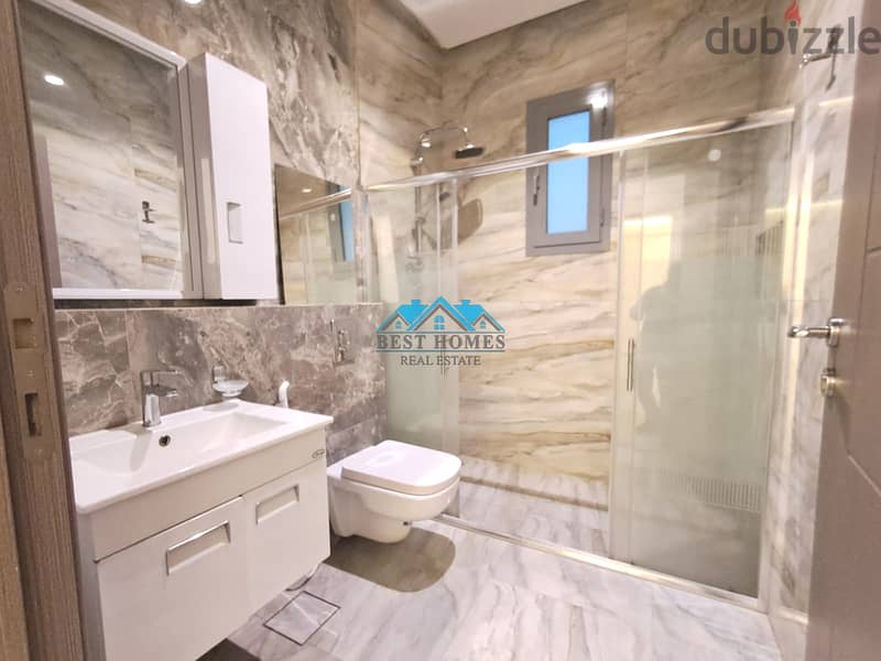 Bright 2 Bedroom Apartment with Rooftop in Rumaithiya 5