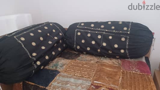 2 Bolsters with black silk covers