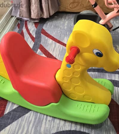 6 month used child cycle and toy for sell in salmiya