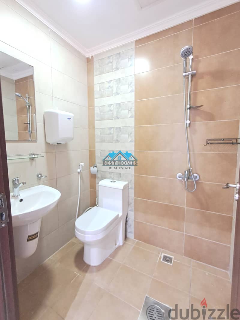 Bright 4 Master Bedroom Apartment with Balcony in Rumaithiya 8