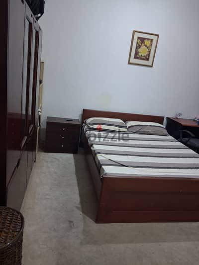A spacious bedroom with bathroom for rent riggae