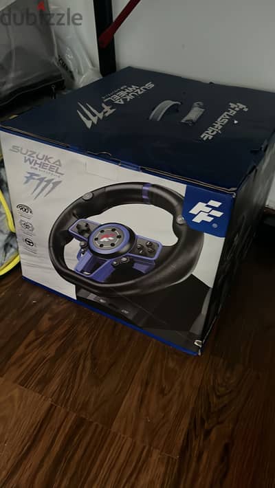 used for 2 days only wheel with pedals and shifter