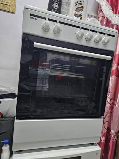 Wansa stove with 4 burner and oven inside