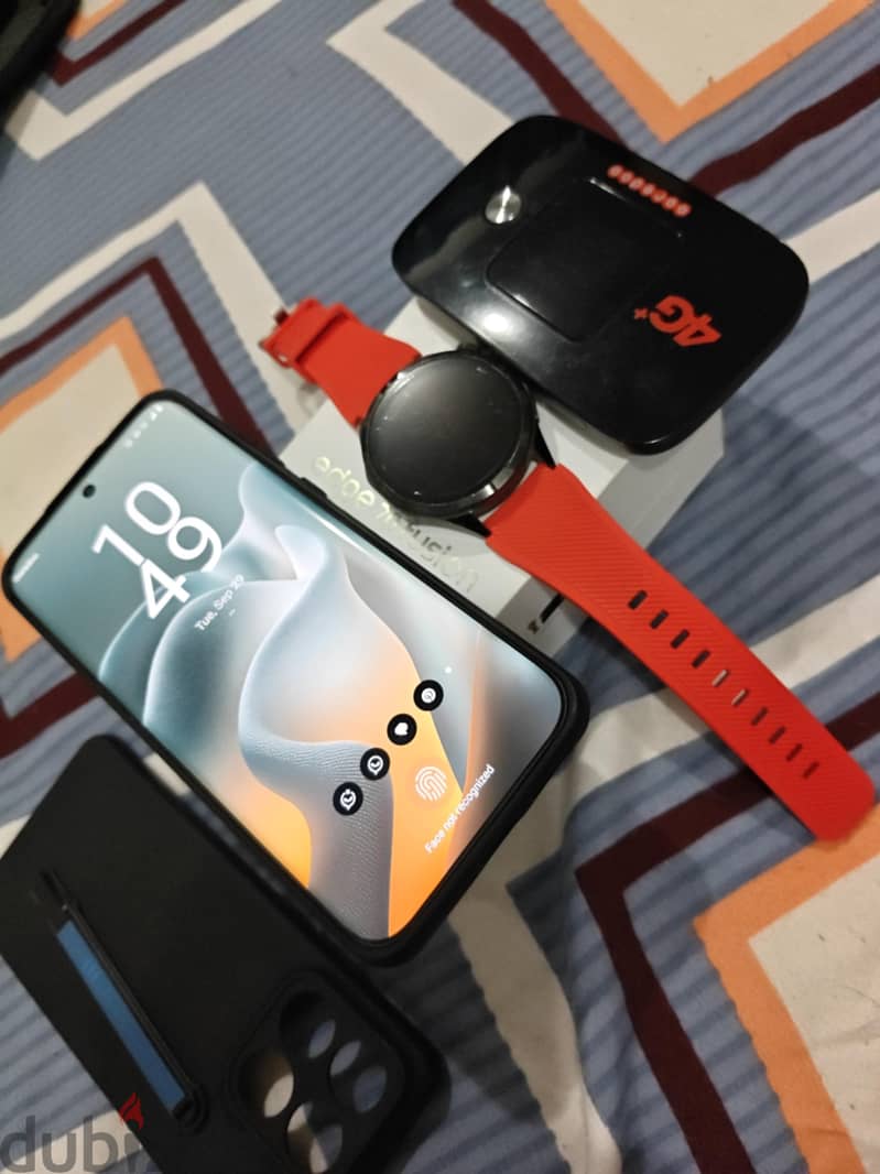 Motorola Watch gt4 ,mobile  phone fusion 70 edge, router and cases 1