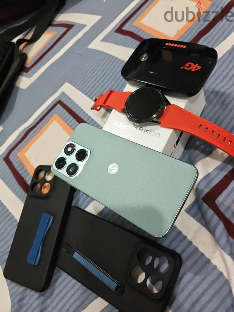 Motorola Watch gt4 ,mobile  phone fusion 70 edge, router and cases 2