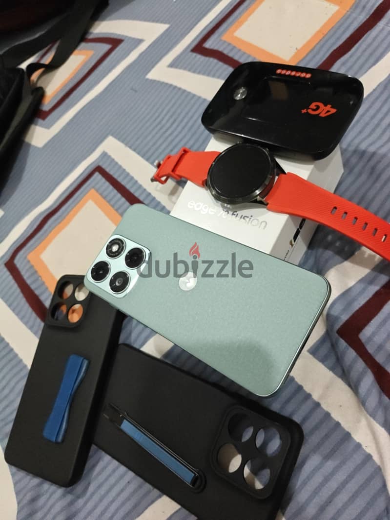 Motorola Watch gt4 ,mobile  phone fusion 70 edge, router and cases 3