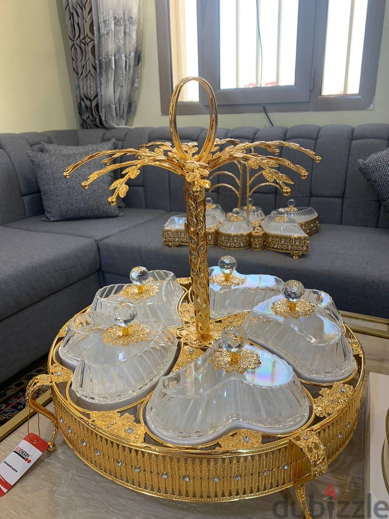two butterfly/leaf layout and one round tired based serving trays 1
