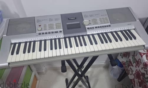 yamaha keyboard with stand available for sale