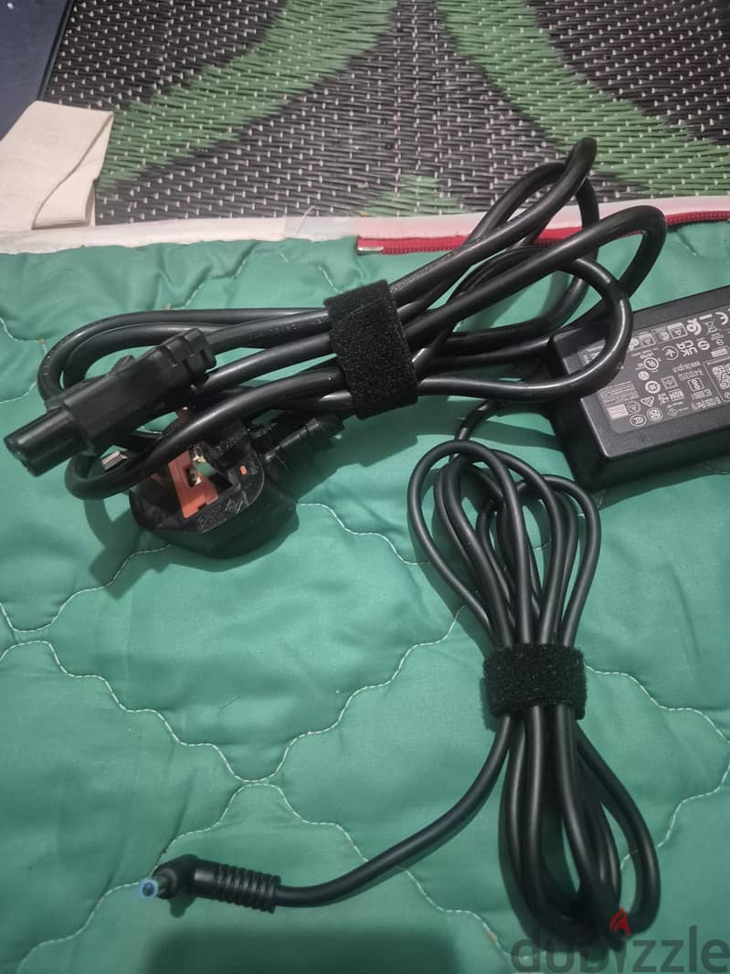HP Laptop original charger excellent working condition available 1