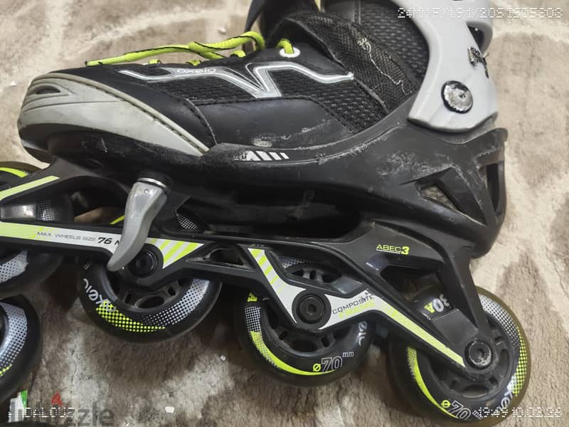 OXELO size 32-35.20-22. . good condition roller skates 1