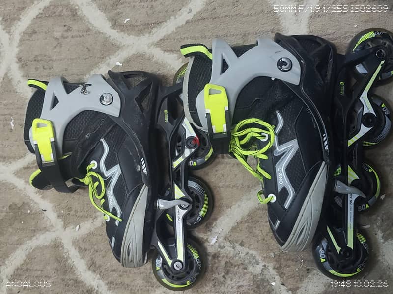 OXELO size 32-35.20-22. . good condition roller skates 3
