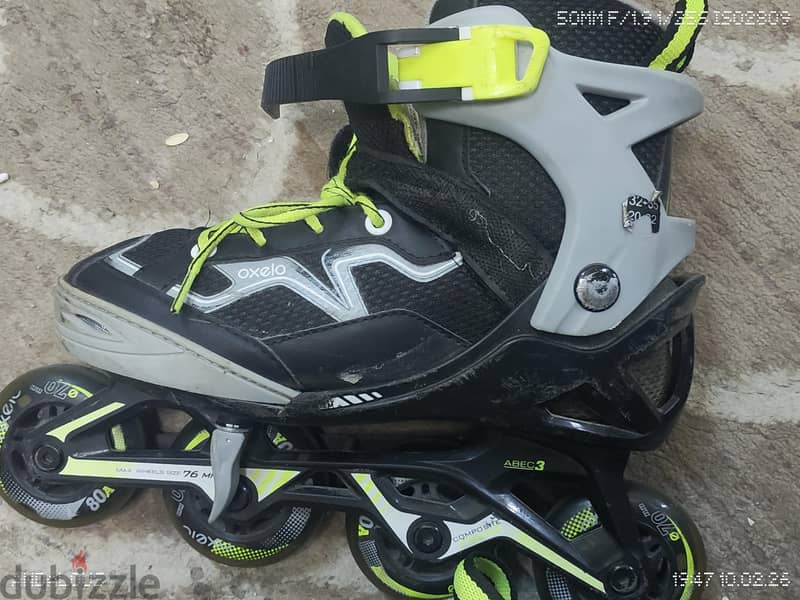 OXELO size 32-35.20-22. . good condition roller skates 5