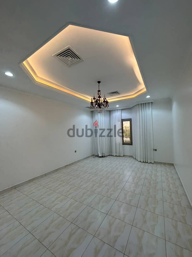 Full residential floor with a balcony for rent in Al-Adan 2