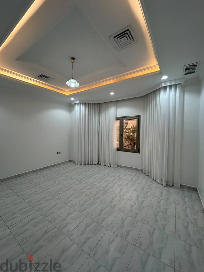 Full residential floor with a balcony for rent in Al-Adan 4