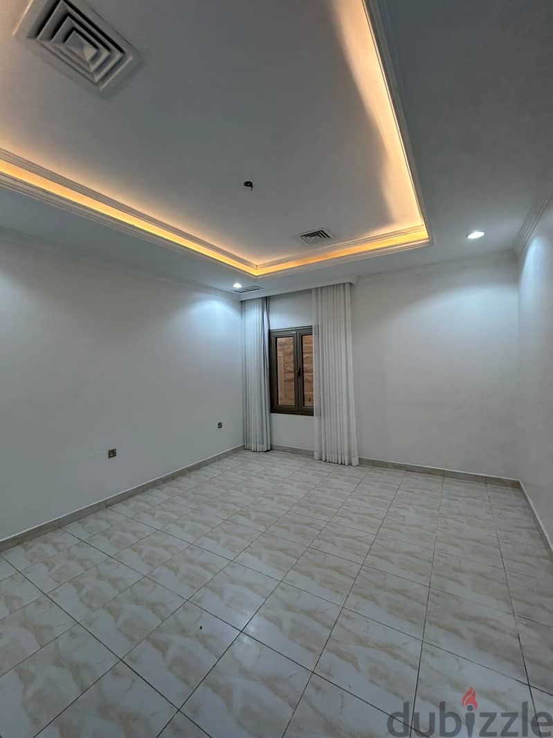 Full residential floor with a balcony for rent in Al-Adan 5
