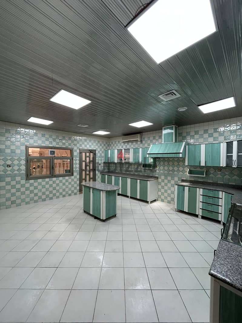 Full residential floor with a balcony for rent in Al-Adan 6