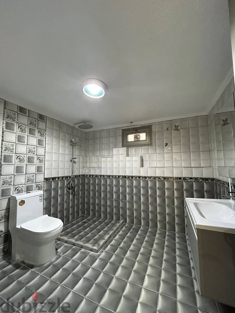 Full residential floor with a balcony for rent in Al-Adan 7