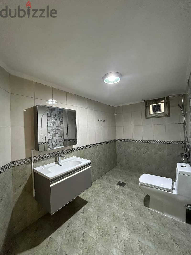 Full residential floor with a balcony for rent in Al-Adan 8