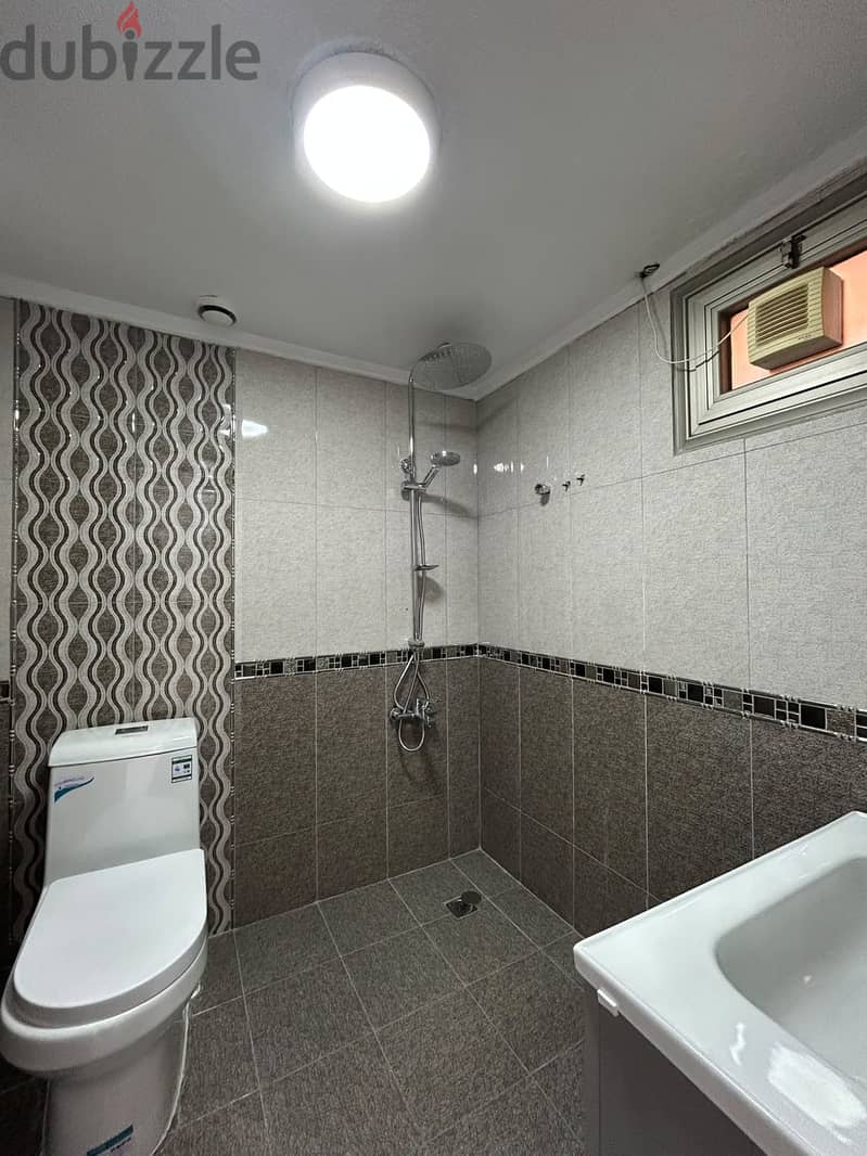 Full residential floor with a balcony for rent in Al-Adan 9