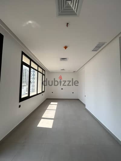 Semi-furnished apartment with a balcony and partial sea view for rent
