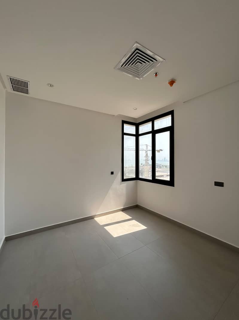 Semi-furnished apartment with a balcony and partial sea view for rent 2
