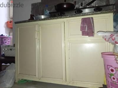 Aluminium. kitchen stoves. cubord. with marble stone