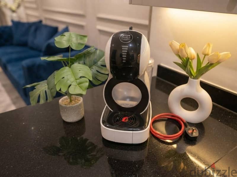 ماكينة قهوة نسكافيه دولتشي غوستو (NESCAFÉ Dolce Gusto) 1