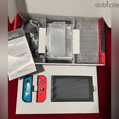 Brand new Nintendo Switch 32GB Red/Blue