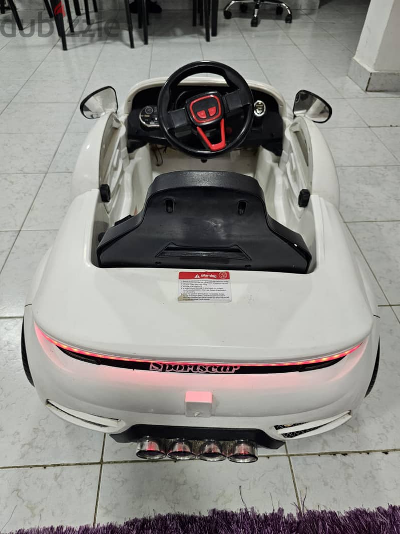 Kids ride on electric car white with Remote control with lights 2
