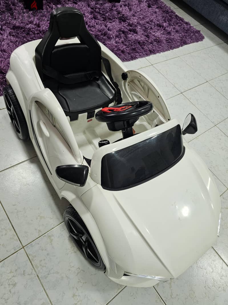 Kids ride on electric car white with Remote control with lights 3