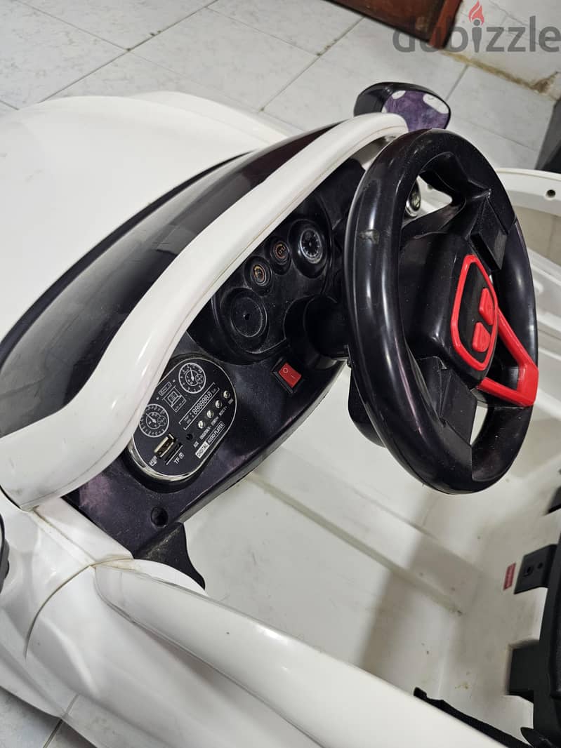 Kids ride on electric car white with Remote control with lights 4