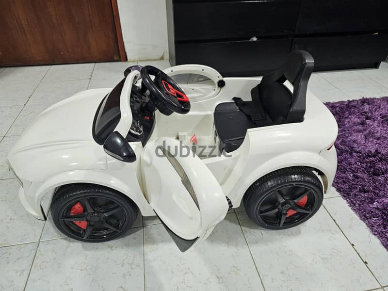 Kids ride on electric car white with Remote control with lights 6