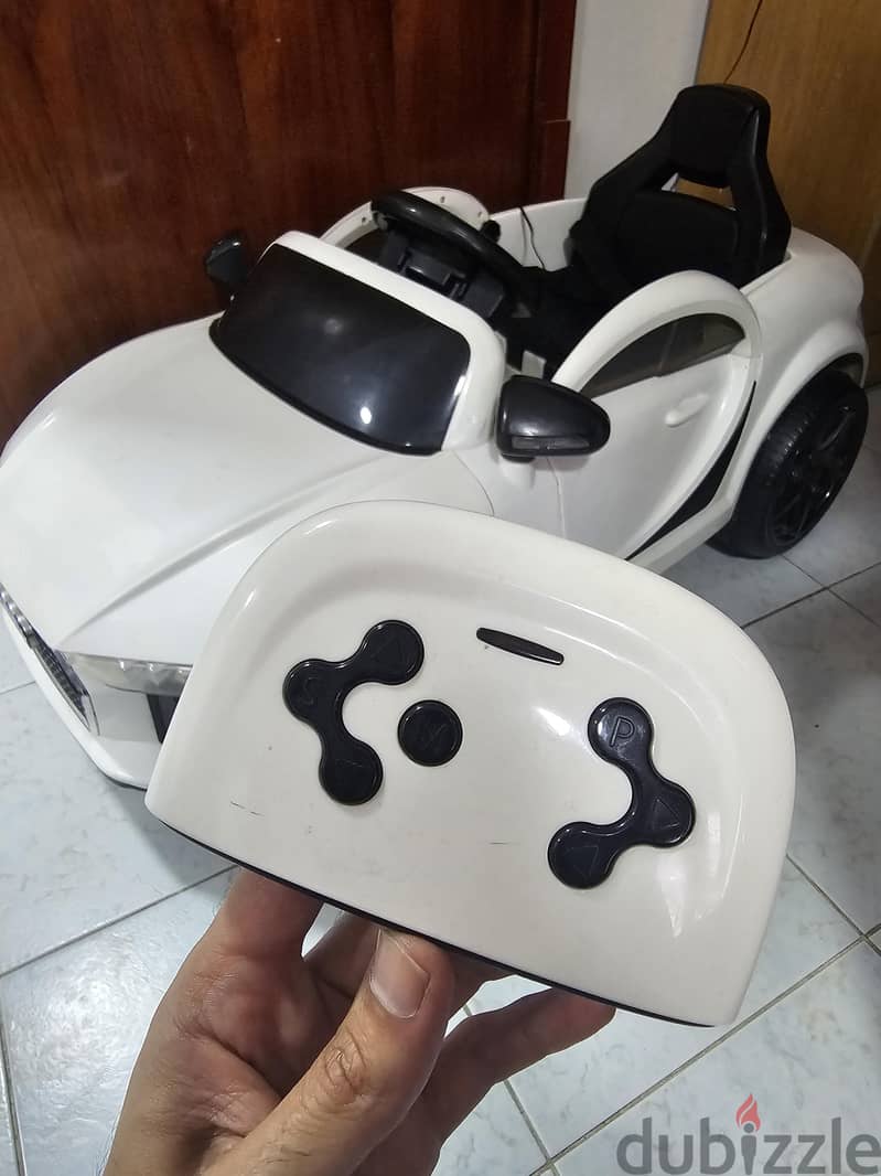 Kids ride on electric car white with Remote control with lights 7