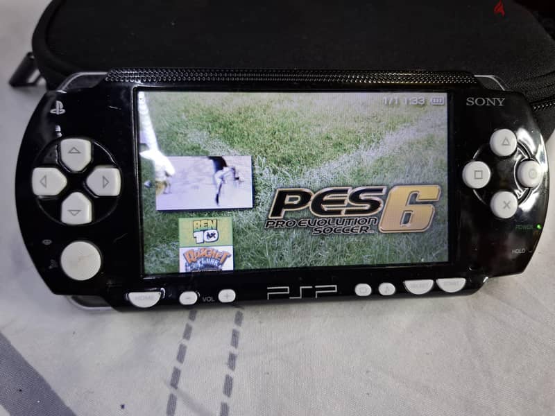 PSP P1000 BLACK 2GB 13 PSP GAME,15 NES,15 GAMEBOY 2