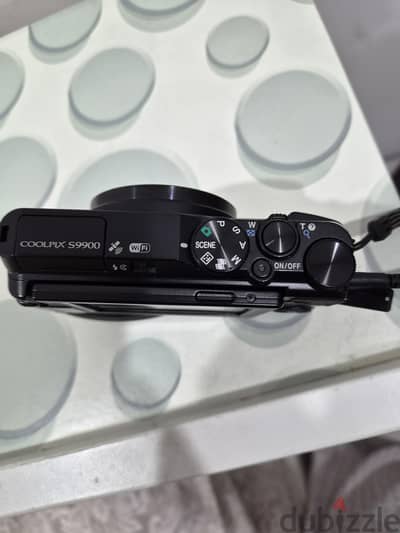 Nikon Coolpix S9900 (30x optical zoom) excellent condition with tripod