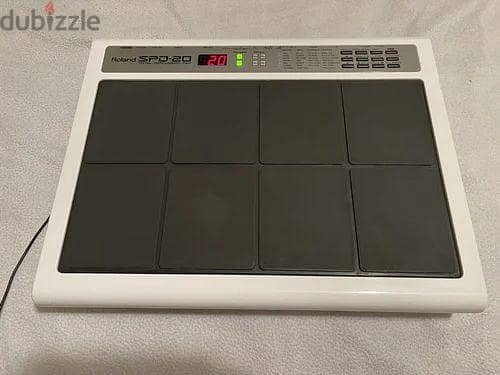 roland spd 20 pad with bag pawer adepter . have 2 octapad 2