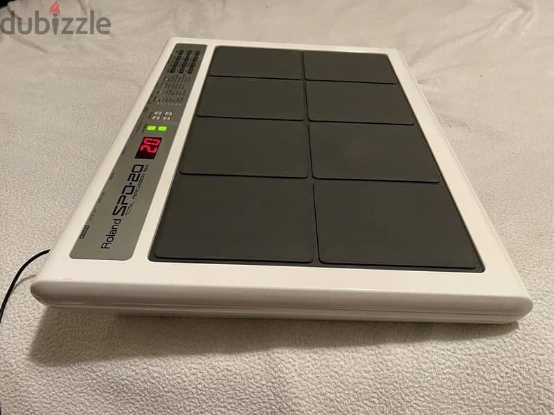 roland spd 20 pad with bag pawer adepter . have 2 octapad 5
