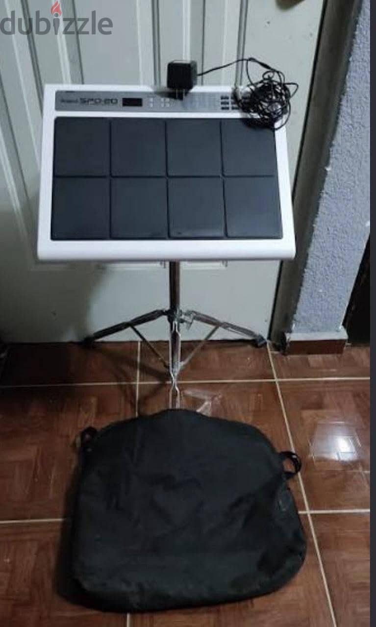 roland spd 20 pad with bag pawer adepter . have 2 octapad 7