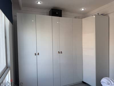 IKEA PAX Corner Wardrobe Combination–High-Gloss White -450 KD Original