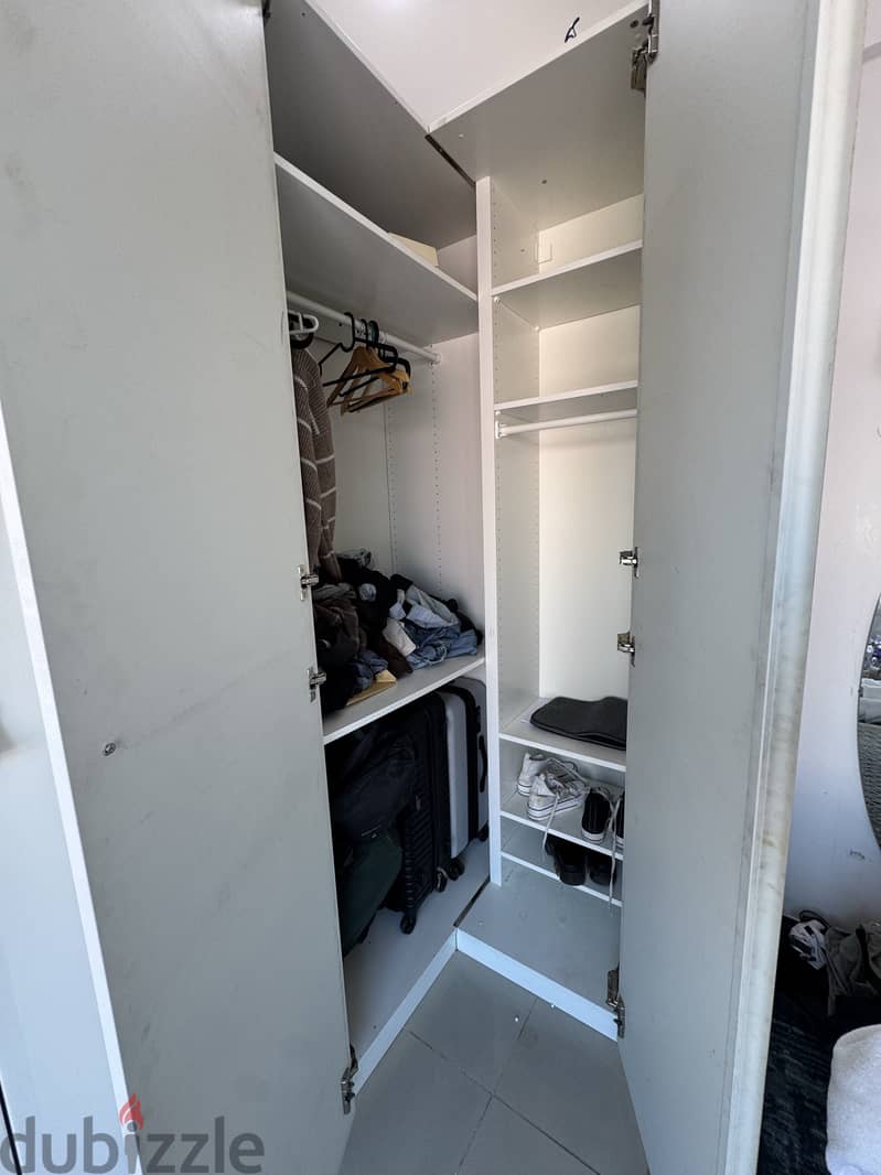 IKEA PAX Corner Wardrobe Combination–High-Gloss White -450 KD Original 1
