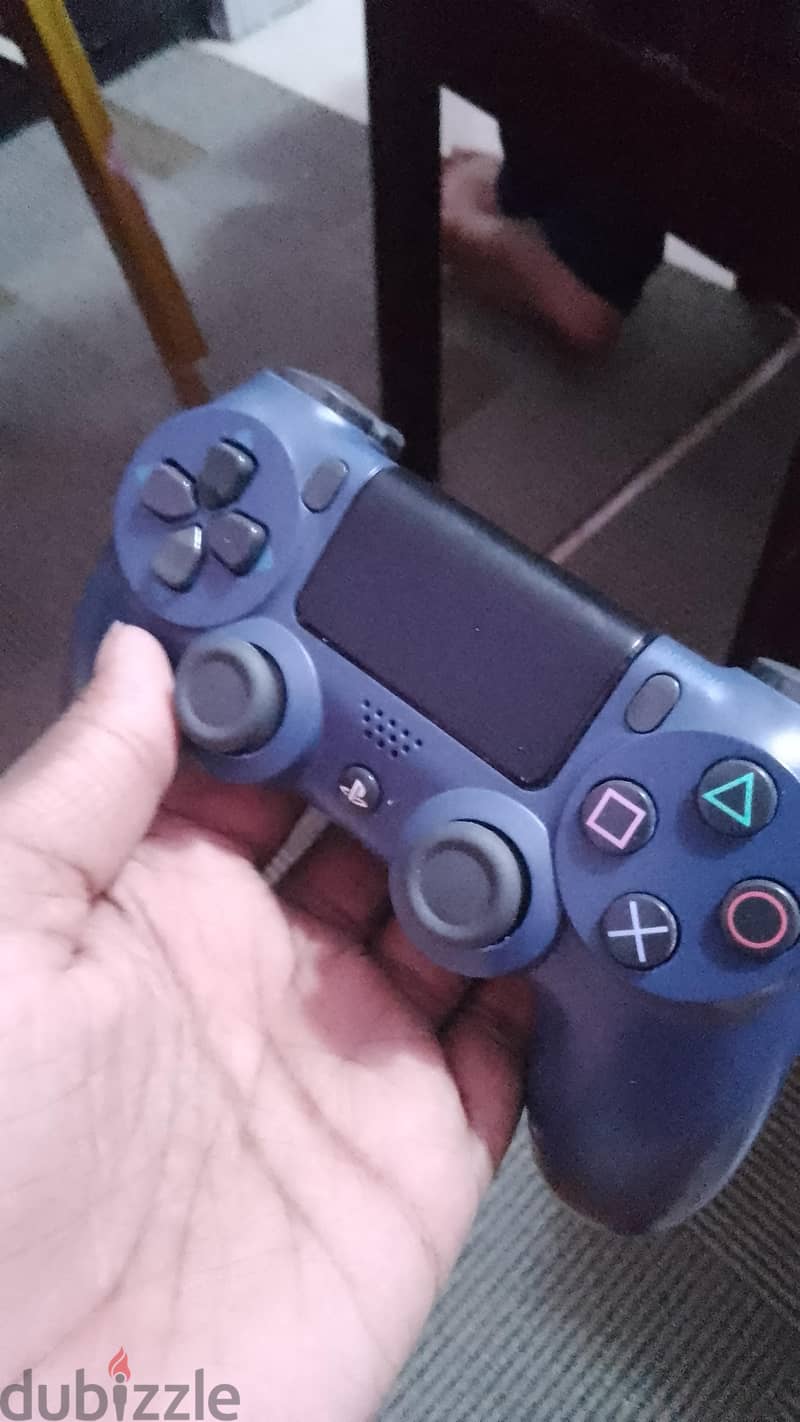 PS4 Bundle + 2 Controllers + 5 Games | 70 KWD 3